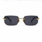 Brilleo Lux randlose Sonnenbrille mit goldenem Metallgestell und rechteckigen dunklen Gläsern, Frontansicht